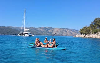 On Board the catamaran Floramye on our way to Croatia, day 2 - paddle boarding